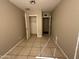 Well-lit bedroom with double door closet and tile floors at 6637 N 54Th Ave, Glendale, AZ 85301