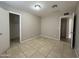 Bedroom with tile floor and closet at 6637 N 54Th Ave, Glendale, AZ 85301