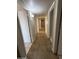 Clean hallway with tile flooring and access to bedrooms at 6637 N 54Th Ave, Glendale, AZ 85301