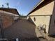 Side yard with chain link fence and gravel at 6637 N 54Th Ave, Glendale, AZ 85301