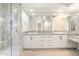 Elegant bathroom with a double vanity, marble finishes, and a large walk-in shower at 6857 E Montreal Pl, Scottsdale, AZ 85254