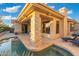 Luxury pool and spa with stone accents and patio area at 6857 E Montreal Pl, Scottsdale, AZ 85254