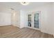 Bedroom with french doors leading to backyard at 1010 W Oregon Ave, Phoenix, AZ 85013