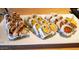 Sushi rolls on a white plate at 1010 W Oregon Ave, Phoenix, AZ 85013