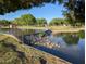 Small waterfall cascading into a calm lake at 1010 W Oregon Ave, Phoenix, AZ 85013