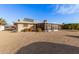 View of home and backyard with screened porch at 13019 W Rampart Dr, Sun City West, AZ 85375