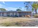 Side view of the house and fenced patio area at 15602 N 98Th Ave, Sun City, AZ 85351