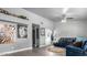Spacious living room with dark blue leather sectional sofa at 20165 W Moccasin Trl, Buckeye, AZ 85326