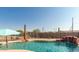 Relaxing pool area with a waterfall feature at 20165 W Moccasin Trl, Buckeye, AZ 85326