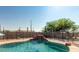 Refreshing pool with a waterfall feature at 20165 W Moccasin Trl, Buckeye, AZ 85326