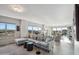 Open concept living room with city views and modern furniture at 2201 N Central Ave # 6F, Phoenix, AZ 85004