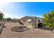 Landscaped backyard with gravel and lemon tree at 2261 N Demaret Dr, Mesa, AZ 85215