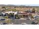 Aerial view of the country club with parking and surrounding landscape at 2261 N Demaret Dr, Mesa, AZ 85215