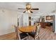 Open concept dining area with kitchen and living room views at 2261 N Demaret Dr, Mesa, AZ 85215