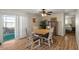 Charming dining room with sliding glass door leading to patio at 2261 N Demaret Dr, Mesa, AZ 85215