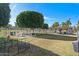Community dog park with shaded seating areas at 2261 N Demaret Dr, Mesa, AZ 85215