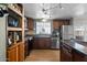 Fully equipped kitchen with ample cabinetry and stainless steel appliances at 2261 N Demaret Dr, Mesa, AZ 85215