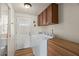Laundry room with washer, dryer, and cabinets at 2261 N Demaret Dr, Mesa, AZ 85215