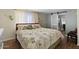 Main bedroom with barn door to bathroom and large closet at 2261 N Demaret Dr, Mesa, AZ 85215
