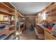 Well-equipped workshop with shelves, workbench, and tools at 2261 N Demaret Dr, Mesa, AZ 85215