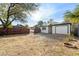 Spacious backyard with gravel and detached garage at 2534 E Maryland Dr, Tempe, AZ 85288