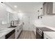 Bright kitchen with white subway tile backsplash and stainless steel appliances at 5534 N 42Nd Ln, Phoenix, AZ 85019