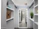 Spacious walk-in closet with built-in shelves and mirror at 8508 E Mustang Trl, Scottsdale, AZ 85258