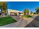 Beautiful contemporary home with well manicured lawn at 8508 E Mustang Trl, Scottsdale, AZ 85258