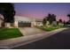 Modern home with a large driveway and beautiful landscaping at 8508 E Mustang Trl, Scottsdale, AZ 85258