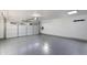 Spacious garage with epoxy flooring and an EV charger at 8508 E Mustang Trl, Scottsdale, AZ 85258