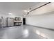 Spacious garage with built-in storage cabinets and epoxy flooring at 8508 E Mustang Trl, Scottsdale, AZ 85258