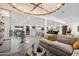 Open concept living space showcasing a stylish living area and modern kitchen at 8508 E Mustang Trl, Scottsdale, AZ 85258
