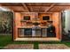 Well-equipped outdoor kitchen with stainless steel appliances at 8508 E Mustang Trl, Scottsdale, AZ 85258
