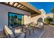 Relaxing patio area with comfortable seating and pergola at 8508 E Mustang Trl, Scottsdale, AZ 85258