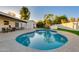 Inviting freeform pool with adjacent patio seating at 8508 E Mustang Trl, Scottsdale, AZ 85258