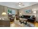 Living room with comfortable seating and large windows at 9442 E Jenan Dr, Scottsdale, AZ 85260