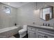 Bathroom with patterned tile, glass shower, and floating vanity at 9732 N Fireridge Trl, Fountain Hills, AZ 85268