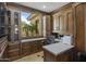 Home office with built-in cabinetry and large window at 9732 N Fireridge Trl, Fountain Hills, AZ 85268