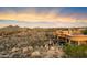 Expansive backyard with fire pit and mountain views at 9782 E Troon North Dr, Scottsdale, AZ 85262