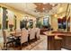 Open concept dining room with a large table and kitchen views at 9782 E Troon North Dr, Scottsdale, AZ 85262