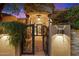 Ornate entry gate leading to a grand entrance at 9782 E Troon North Dr, Scottsdale, AZ 85262