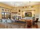 Open great room with built-in entertainment center and fireplace at 9782 E Troon North Dr, Scottsdale, AZ 85262