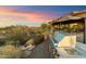 Built-in outdoor grill with sunset views at 9782 E Troon North Dr, Scottsdale, AZ 85262