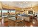 Open concept kitchen with large island, granite countertops, and views at 9782 E Troon North Dr, Scottsdale, AZ 85262