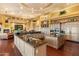 Open kitchen with granite island and stainless steel appliances at 9782 E Troon North Dr, Scottsdale, AZ 85262