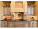 Modern kitchen features granite countertops and custom cabinetry at 9782 E Troon North Dr, Scottsdale, AZ 85262