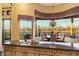 Gourmet kitchen boasts a breakfast nook with scenic views and granite countertops at 9782 E Troon North Dr, Scottsdale, AZ 85262