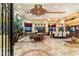 Spacious living room with high ceilings, fireplace and dining area at 9782 E Troon North Dr, Scottsdale, AZ 85262