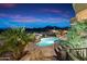 Relaxing freeform pool and spa with mountain views at 9782 E Troon North Dr, Scottsdale, AZ 85262