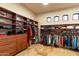Custom designed walk-in closet with abundant storage at 9782 E Troon North Dr, Scottsdale, AZ 85262